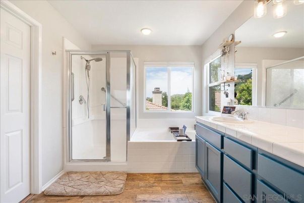 Bathroom, Glass Shower, Interior, Recessed Lighting, Tile Countertops, Wood Texture Flooring