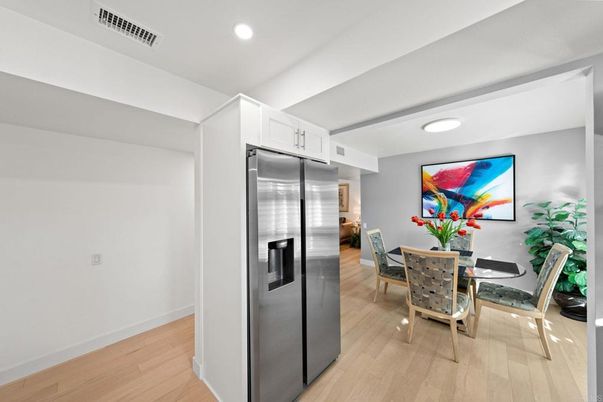 Dining room, Interior, Kitchen, Recessed Lighting, Stainless Steel Appliances, Wood Texture Flooring