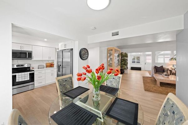 Dining room, Interior, Kitchen, Living room, Recessed Lighting, Stainless Steel Appliances, Wood Texture Flooring