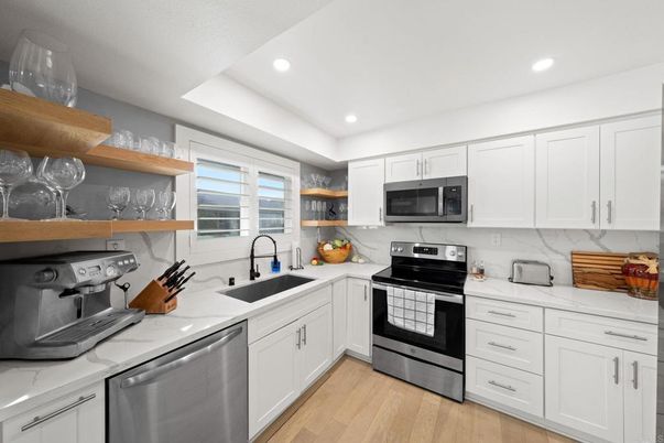 Interior, Kitchen, Recessed Lighting, Stainless Steel Appliances, Wood Texture Flooring