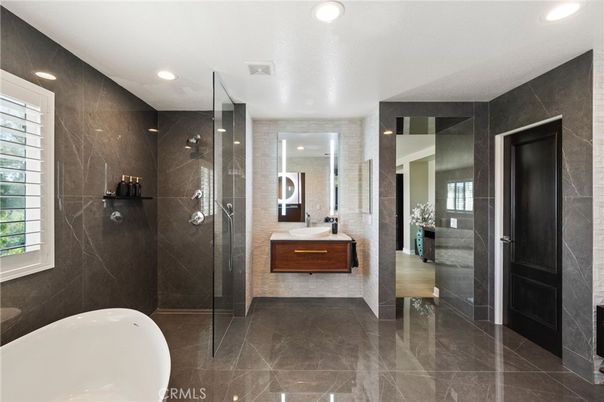 Bathroom, Free Standing Baths, Glass Shower, Interior, Marble Walls, Recessed Lighting