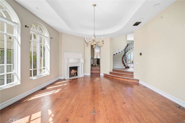 Chandelier, Fireplace, Interior, Recessed Lighting, Wood Texture Flooring