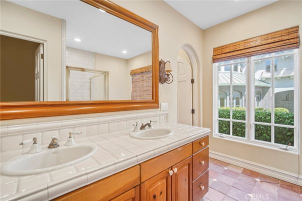 Bathroom, Dual Sink Vanities, Interior, Recessed Lighting, Tile Countertops