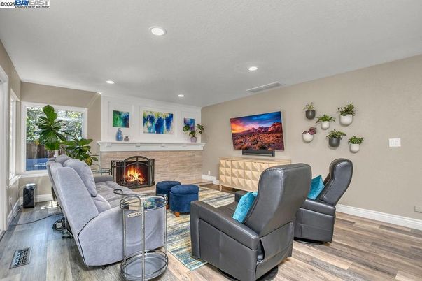 Fireplace, Interior, Living room, Recessed Lighting, Wood Texture Flooring