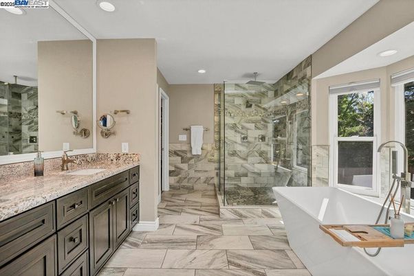 Bathroom, Dual Sink Vanities, Free Standing Baths, Glass Shower, Interior, Marble, Marble Walls, Recessed Lighting