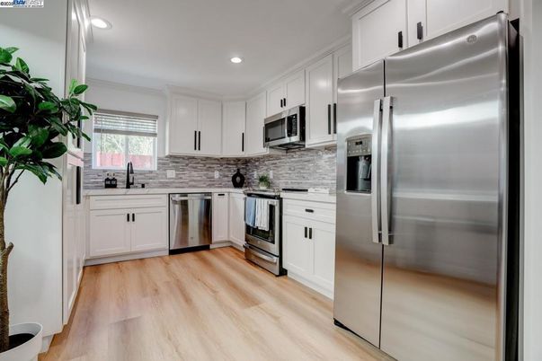 Interior, Kitchen, Recessed Lighting, Stainless Steel Appliances, Wood Texture Flooring