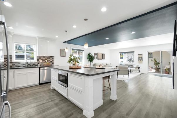 Dining room, Interior, Kitchen, Living room, Pendant Lights, Recessed Lighting, Stainless Steel Appliances, Wood Texture Flooring