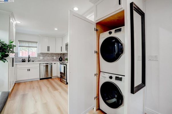 Interior, Kitchen, Recessed Lighting, Utility Closets, Washer, Wood Texture Flooring