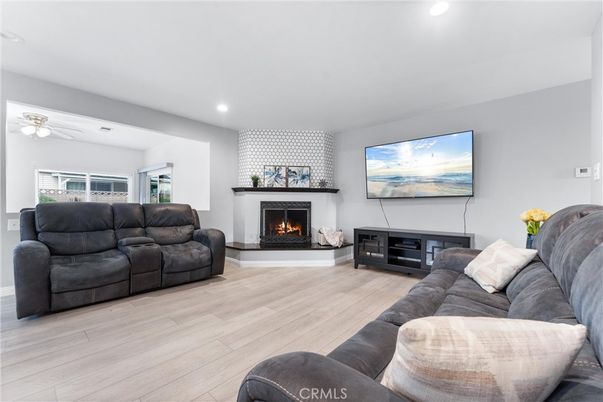 Fireplace, Interior, Living room, Recessed Lighting, Wood Texture Flooring
