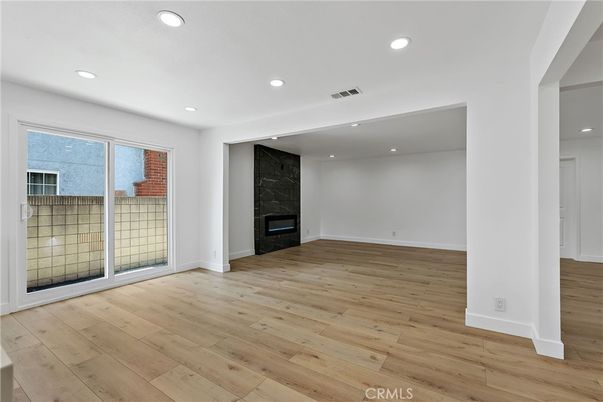 Empty room, Fireplace, Interior, Recessed Lighting, Wood Texture Flooring