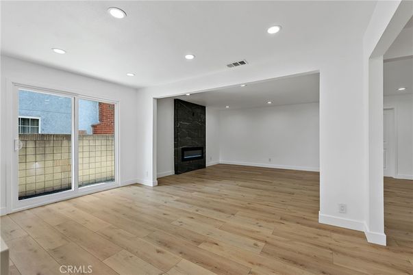 Empty room, Fireplace, Interior, Recessed Lighting, Wood Texture Flooring