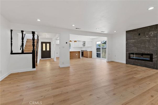 Empty room, Fireplace, Interior, Kitchen, Recessed Lighting, Wood Texture Flooring