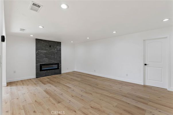 Empty room, Fireplace, Interior, Recessed Lighting, Wood Texture Flooring