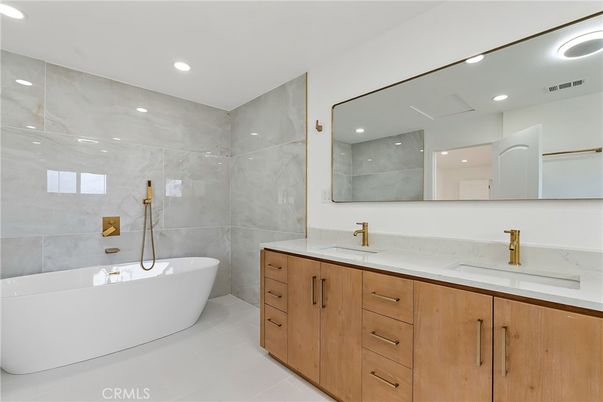 Bathroom, Dual Sink Vanities, Free Standing Baths, Interior, Marble Walls, Recessed Lighting