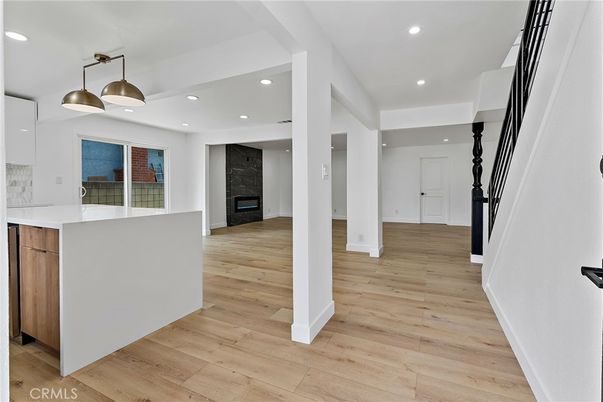Fireplace, Interior, Kitchen, Pendant Lights, Recessed Lighting, Wood Texture Flooring
