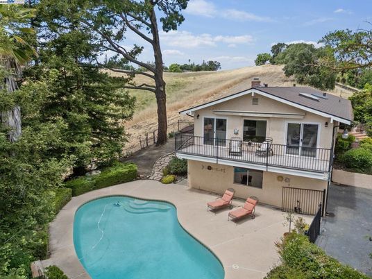 Exterior, Pool, Solar Panels