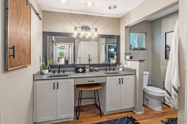 Bathroom, Dual Sink Vanities, Interior, Recessed Lighting, Wood Texture Flooring