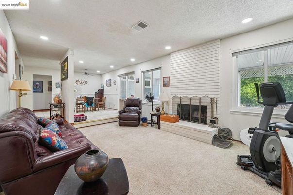 Dining room, Fireplace, Fitness Equipment, Interior, Living room, Recessed Lighting