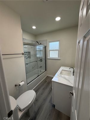 Bathroom, Glass Shower, Interior, Marble Walls, Recessed Lighting, Wood Texture Flooring