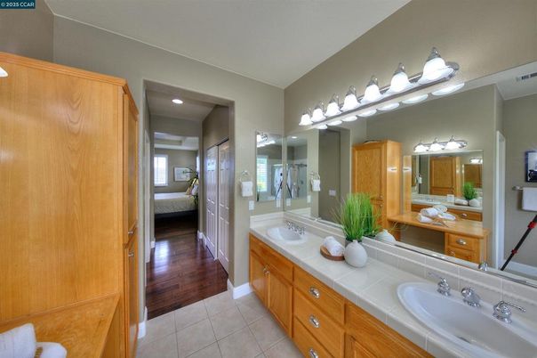 Bathroom, Dual Sink Vanities, Interior, Recessed Lighting, Tile Countertops, Wood Texture Flooring