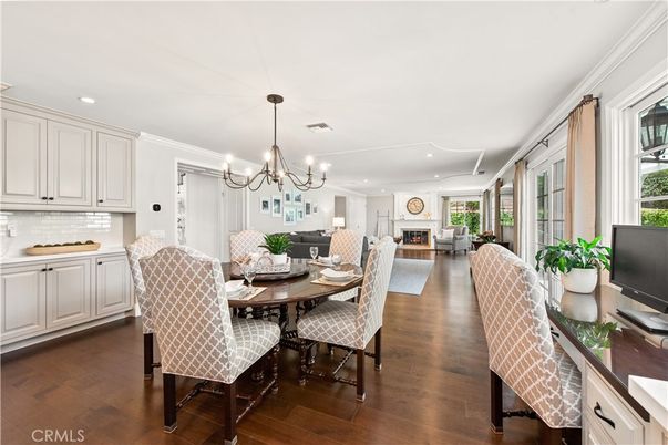 Chandelier, Dining room, Fireplace, Interior, Kitchen, Living room, Pendant Lights, Recessed Lighting, Wood Texture Flooring