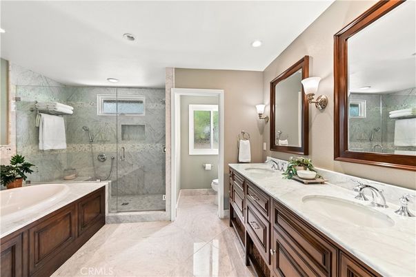 Bathroom, Dual Sink Vanities, Glass Shower, Interior, Marble Walls, Recessed Lighting