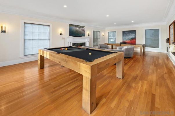 Billiard Table, Fireplace, Game Room, Interior, Living room, Recessed Lighting, Wood Texture Flooring