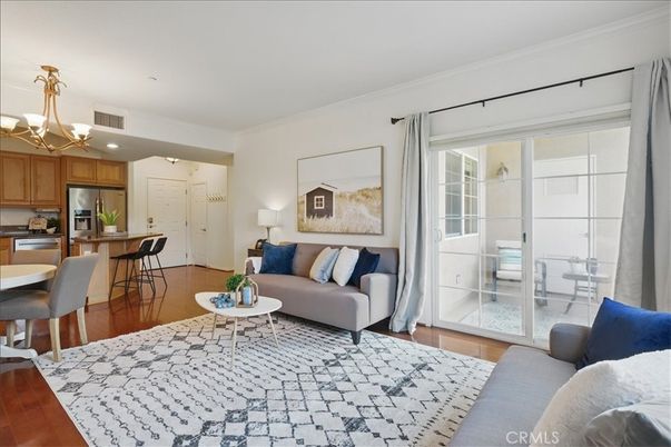 Chandelier, Dining room, Interior, Kitchen, Living room, Recessed Lighting, Stainless Steel Appliances, Wood Texture Flooring