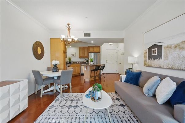 Chandelier, Dining room, Interior, Kitchen, Living room, Recessed Lighting, Stainless Steel Appliances, Wood Texture Flooring