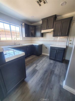 Interior, Kitchen, Tile Countertops, Wood Texture Flooring