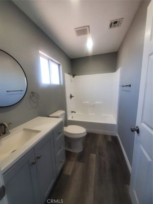 Bathroom, Dual Sink Vanities, Interior, Recessed Lighting, Wood Texture Flooring