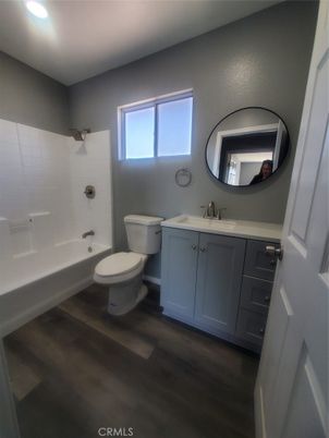 Bathroom, Dual Sink Vanities, Interior, Recessed Lighting, Wood Texture Flooring