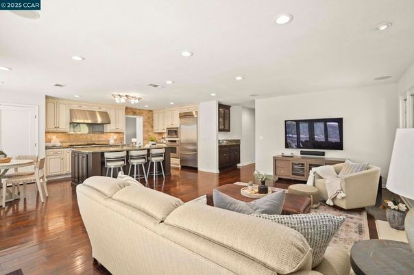 Chandelier, Dining room, Interior, Kitchen, Living room, Recessed Lighting, Stainless Steel Appliances, Wood Texture Flooring