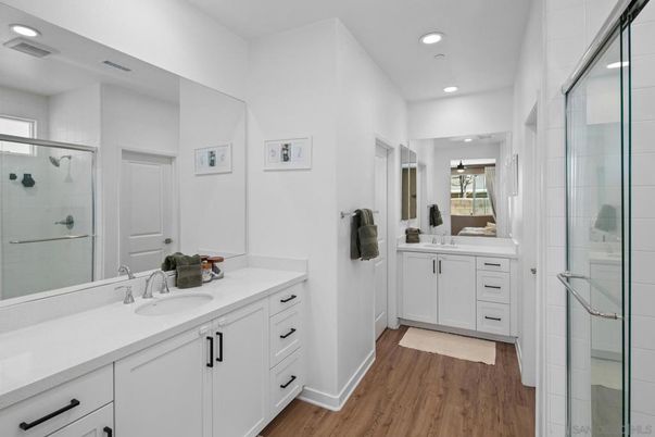 Bathroom, Dual Sink Vanities, Glass Shower, Interior, Recessed Lighting, Wood Texture Flooring