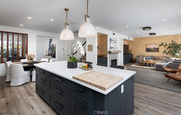 Dining room, Fireplace, Interior, Kitchen, Living room, Pendant Lights, Recessed Lighting, Stone Walls, Wood Texture Flooring