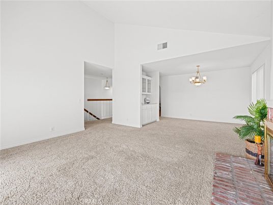 Chandelier, Empty room, Fireplace, Interior
