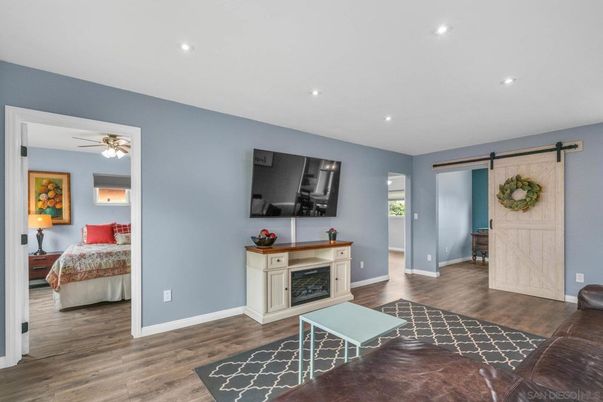 Bedroom, Fireplace, Interior, Recessed Lighting, Wood Texture Flooring