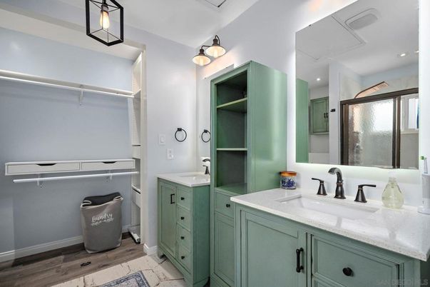 Bathroom, Dual Sink Vanities, Interior, Recessed Lighting, Walk-in Closets, Wood Texture Flooring
