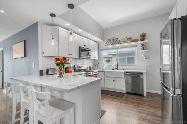 Interior, Kitchen, Pendant Lights, Recessed Lighting, Stainless Steel Appliances, Wood Texture Flooring
