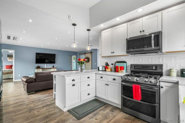 Interior, Kitchen, Pendant Lights, Recessed Lighting, Stainless Steel Appliances, Wood Texture Flooring