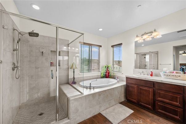 Bathroom, Dual Sink Vanities, Glass Shower, Interior, Recessed Lighting, Wood Texture Flooring