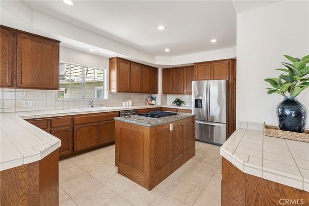 Interior, Kitchen, Recessed Lighting, Stainless Steel Appliances, Tile Countertops