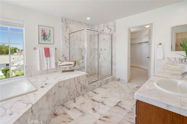 Bathroom, Dual Sink Vanities, Glass Shower, Interior, Marble, Marble Walls, Recessed Lighting