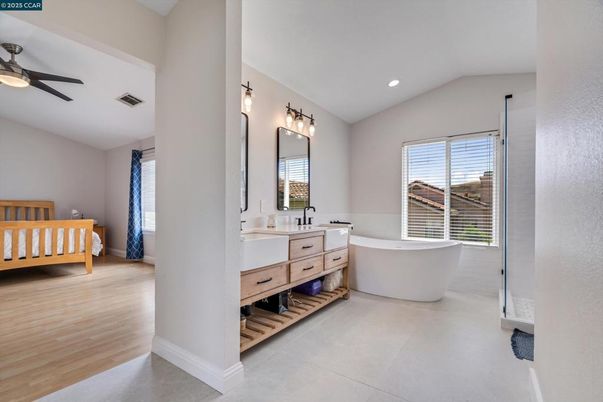 Bathroom, Dual Sink Vanities, Free Standing Baths, Interior, Recessed Lighting, Wood Texture Flooring