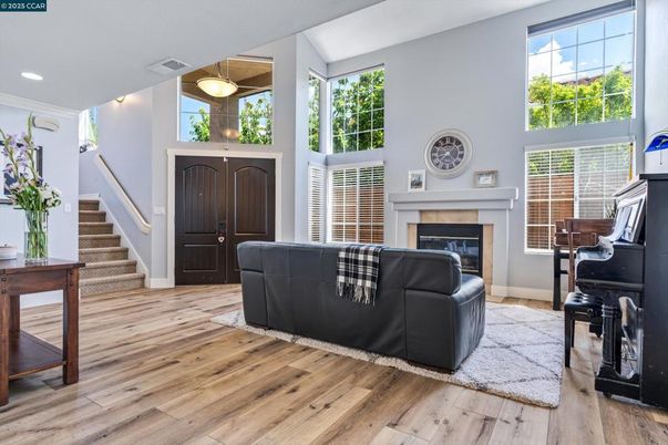 Fireplace, Interior, Living room, Pendant Lights, Piano, Recessed Lighting, Wood Texture Flooring