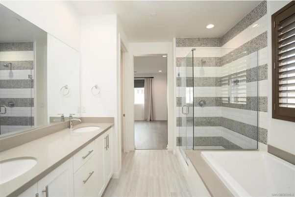 Bathroom, Dual Sink Vanities, Glass Shower, Interior, Recessed Lighting, Wood Texture Flooring