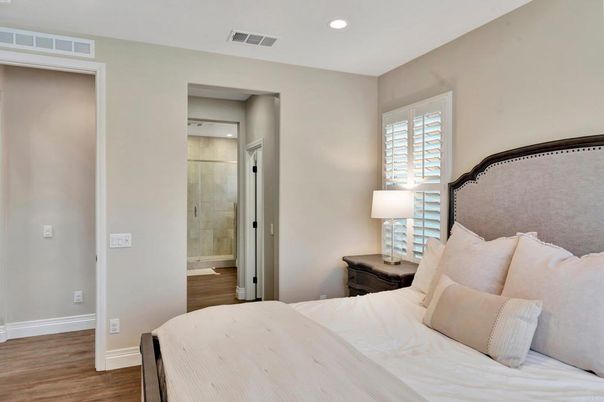 Bathroom, Bedroom, Glass Shower, Interior, Recessed Lighting, Wood Texture Flooring