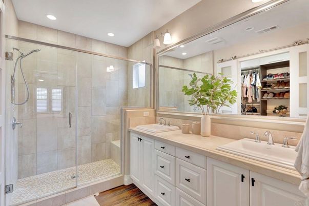 Bathroom, Dual Sink Vanities, Glass Shower, Interior, Recessed Lighting, Wood Texture Flooring