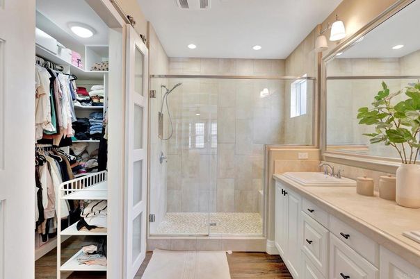 Bathroom, Dual Sink Vanities, Glass Shower, Interior, Recessed Lighting, Walk-in Closets, Wood Texture Flooring