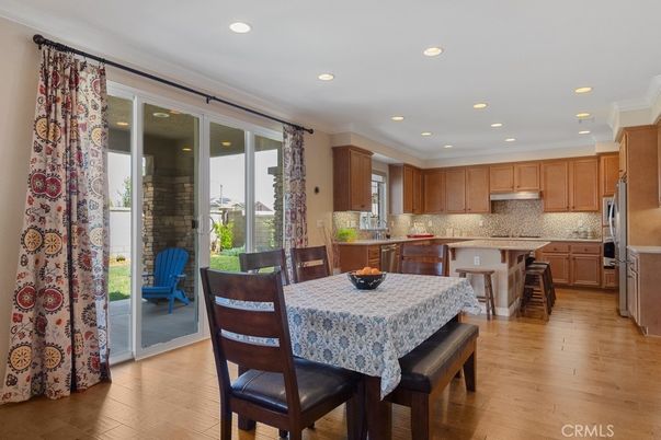 Dining room, Interior, Kitchen, Recessed Lighting, Stainless Steel Appliances, Wood Texture Flooring
